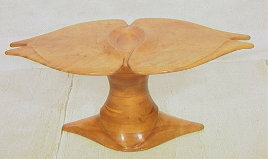 STEWART PAUL Stacked Laminate Winged Table. Sculp: STEWART PAUL Stacked Laminate Winged Table. Sculptural form with raised center. Unsigned. Consigned by owner who acquired directly from the artist. Studio Woodworker.-- Dimensions: H: 21 inches: W: 46