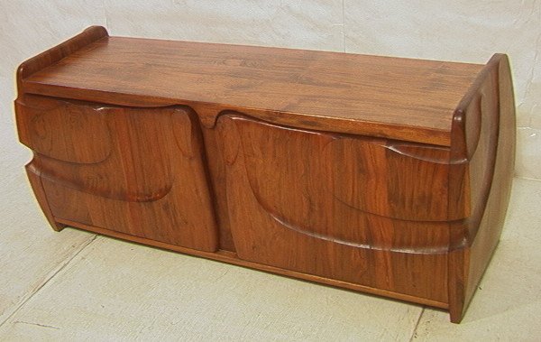 STEWART PAUL Sculpted Paldao Sideboard Cabinet.: STEWART PAUL Sculpted Paldao Sideboard Cabinet. Heavy solid construction. Two doors. Curved sides. Nice grain. Unsigned. Consigned by owner who acquired directly from the artist. Studio Woodworker.-- 