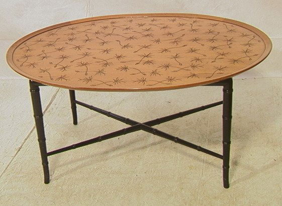 KITTINGER Coffee Cocktail Table. Carved Oval Dish: KITTINGER Coffee Cocktail Table. Carved Oval Dish top on faux bamboo base. Label.-- Dimensions: H: 18 inches: W: 39.25 inches: D: 31 inches ---