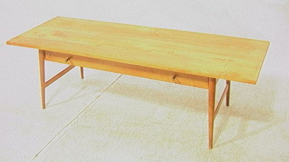 PAUL McCOBB Planner Group Walnut Cocktail Table.: PAUL McCOBB Planner Group Walnut Cocktail Table. Tapered legs. American Modern one drawer coffee table. Marked.-- Dimensions: H: 16 inches: W: 54 inches: D: 20.25 inches ---