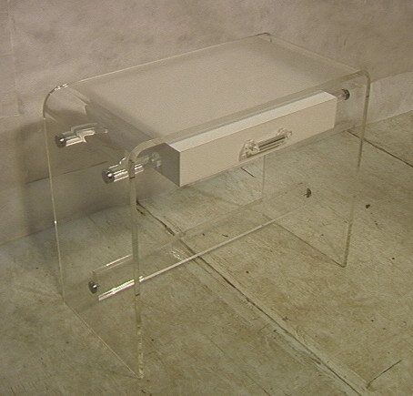 Lucite Vanity with White Acrylic Drawer. Floating: Lucite Vanity with White Acrylic Drawer. Floating Construction. Thick Lucite stretcher.-- Dimensions: H: 30 inches: W: 36.5 inches: D: 18 inches ---