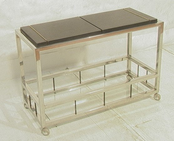 70's Modern Chrome Bar Cart Server. Milo Baughma: 70's Modern Chrome Bar Cart Server. Milo Baughman Style. Black laminate top with wide square chrome frame.-- Dimensions: H: 29.5 inches: W: 44 inches: D: 19 inches ---