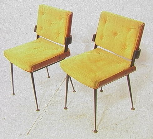 Pr ALAIN RICHARD Gold Upholstered Laminated Side: Pr ALAIN RICHARD Gold Upholstered Laminated Side Chairs. Black Iron Legs. Black vinyl padded Trim. 2 pcs-- Dimensions: H: 29.5 inches: W: 19 inches: D: 19 inches ---