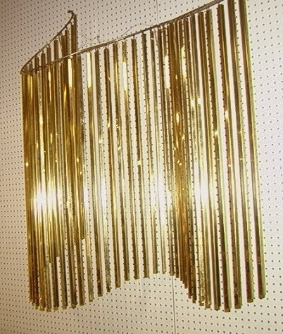 Cascading Bars Jere 1983 Wall Sculpture. Brass C: Cascading Bars Jere 1983 Wall Sculpture. Brass Color.-- Dimensions: H: 46 inches: W: 44 inches: D: 12 inches ---