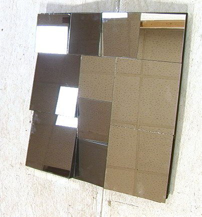 Neal Small Faceted Wall Mirror. Slopes Mirror.: Neal Small Faceted Wall Mirror. Slopes Mirror.-- Dimensions: H: 2 inches: W: 16.5 inches ---
