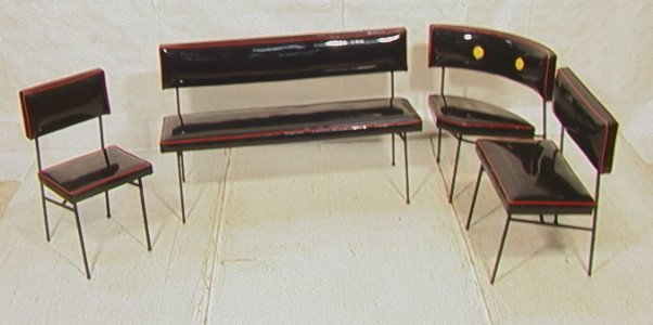 4 pc Iron Seating Set. Black Vinyl. Red Trim Pipi: 4 pc Iron Seating Set. Black Vinyl. Red Trim Piping. Long bench. Three chairs. One with yellow buttons. 4 pcs-- Dimensions: H: 32 inches ---