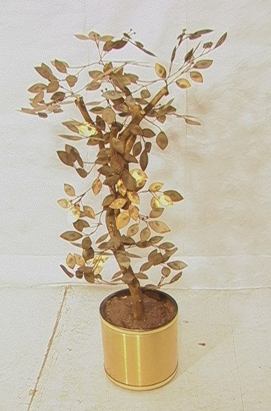 JERE style Metal Wood Tree in Brass Planter. Tree: JERE style Metal Wood Tree in Brass Planter. Tree sculpture. Unsigned.-- Dimensions: H: 55 inches ---