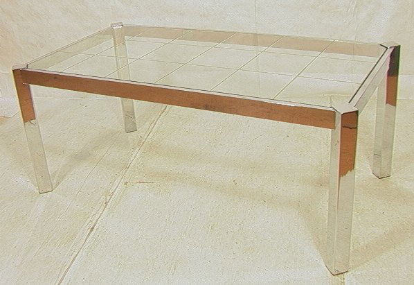 Chrome Glass Dining Table. Incised Checkerboard d: Chrome Glass Dining Table. Incised Checkerboard design to glass. Wide flat chrome frame. Square column legs. -- Dimensions: H: 29 inches: W: 72 inches: D: 38 inches ---