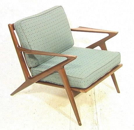 POUL JENSEN for SELIG Lounge Chair. Blue seat Cus: POUL JENSEN for SELIG Lounge Chair. Blue seat Cushions. Angled form arms. Marked: Selig tag. -- Dimensions: H: 26 inches: W: 29 inches: D: 32 inches ---