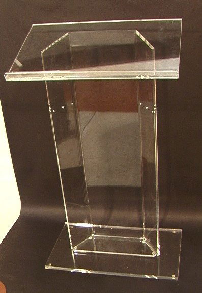 Lucite Lectern. One shelf.: Lucite Lectern. One shelf. -- Dimensions: H: 47.5 inches: W: 26.75 inches: D: 14.75 inches ---