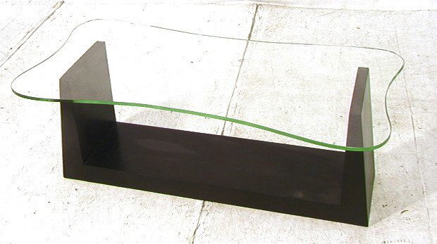GILBERT ROHDE Style Cocktail Coffee Table. Glass: GILBERT ROHDE Style Cocktail Coffee Table. Glass top on U shaped base. -- Dimensions: H: 17 inches: W: 50 inches: D: 25 inches ---