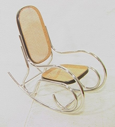 Chrome THONET style Cane Back Rocking Chair. Ebon: Chrome THONET style Cane Back Rocking Chair. Ebonized wood frame rocker with caned seat & back. -- Dimensions: H: 41 inches: W: 21.5 inches: D: 43 inches ---