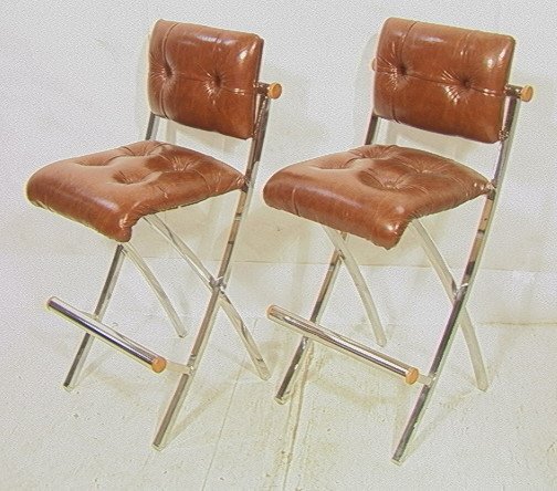 Pr Brown Tufted Vinyl Bar Stools. Chrome "X" side: Pr Brown Tufted Vinyl Bar Stools. Chrome "X" sides. Maple wood Accents. Baystrom Furniture Co. 2 pcs-- Dimensions: H: 42 inches: W: 21 inches: D: 23 inches ---