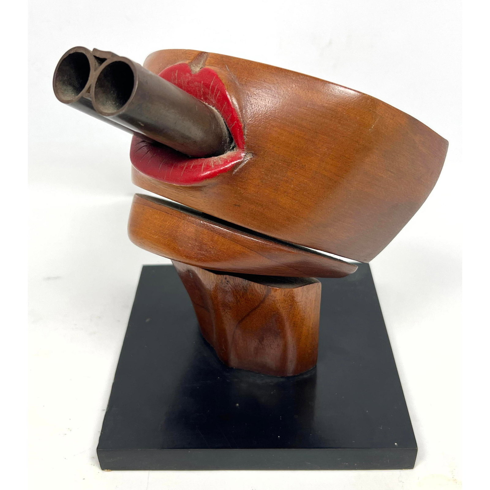 J. Williams Abstract Moder Sculpture. Wood and Steel. Lips with shot gun barrel.: J. Williams Abstract Moder Sculpture. Wood and Steel. Lips with shot gun barrel. Dimensions: Height: 8 inches, Width: 6.25 inches, Depth: 6.25 inches. --- US Packing and Shipping charge: In house ship
