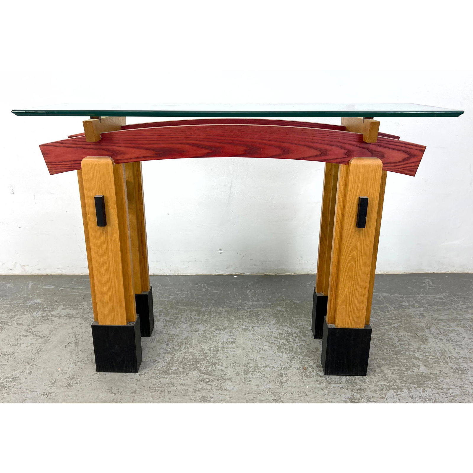 Post Modern Console table possibly designer Jack Ockenga. A postmodern-constructivist base in solid: Post Modern Console table possibly designer Jack Ockenga. A postmodern-constructivist base in solid Ash with inlay work throughout. Dimensions: Height: 38 inches, Width: 53.5 inches, Depth: 18 inches.