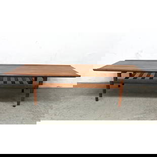 GRETA JALKE Danish Modern Teak Coffee Table. Rolled bowed edges.: GRETA JALKE Danish Modern Teak Coffee Table. Rolled bowed edges. Dimensions: Height: 15 inches, Width: 63 inches, Depth: 23 inches. --- Shipping & Delivery Notice - Don?t bid less because of high auto