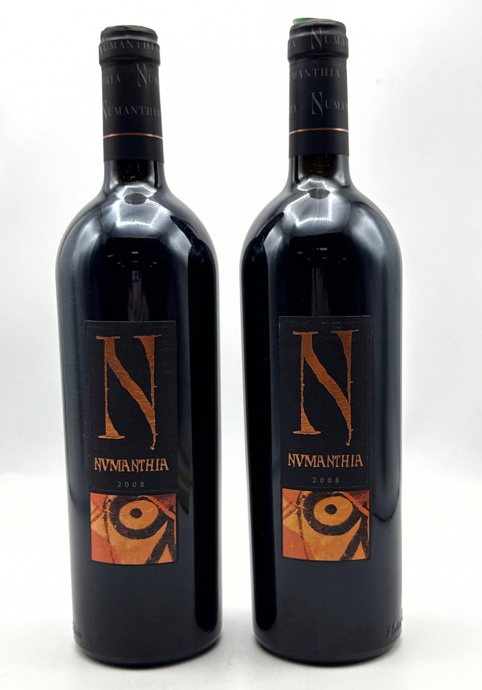 2 pcs - 2008 Bodega Numanthia Toro Numanthia Red Wine: 2 pcs - 2008 Bodega Numanthia Toro Numanthia Red Wine Dimensions: Height: 12 inches, Width: inches. --- Buyers are encouraged to pick up their purchases directly from our location. Please note: we do 