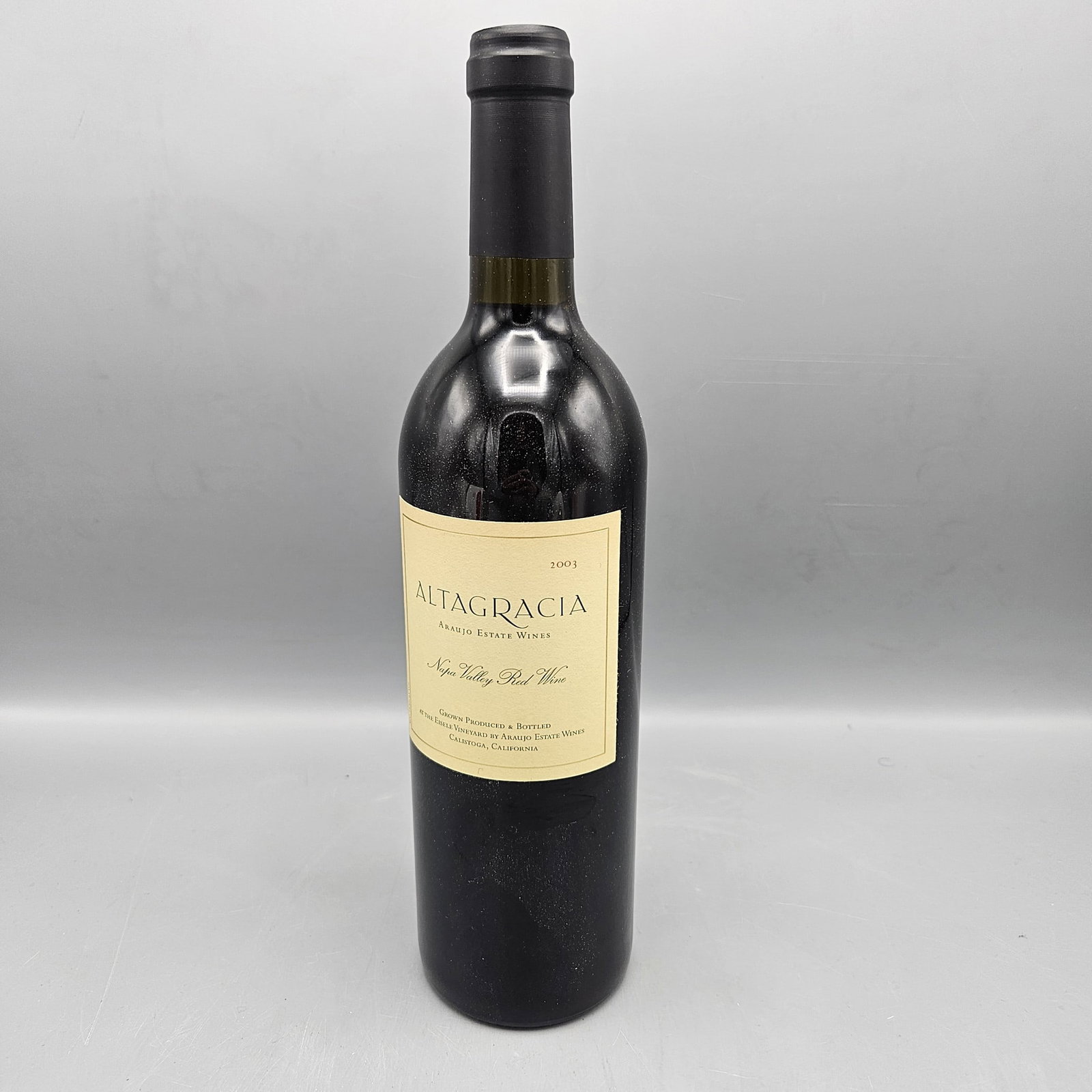 2003 Araujo Estate Altagracia Red Wine: 2003 Araujo Estate Altagracia Red Wine --- Buyers are encouraged to pick up their purchases directly from our location. Please note: we do not offer shipping for spirits to any destination. All Lots a