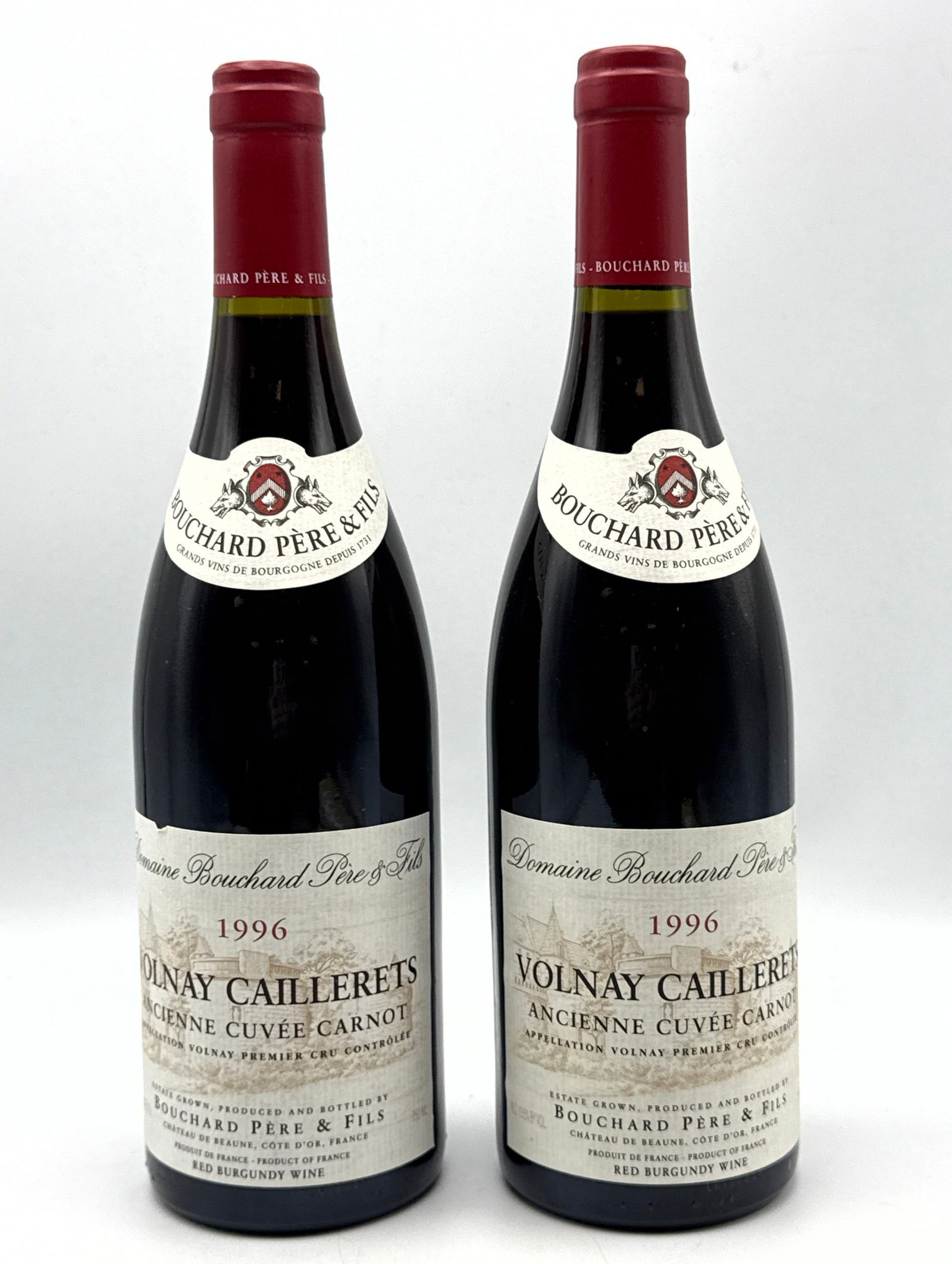 2 pcs - 1996 Bouchard P ere et Fils Volnay 1er Cru Caillerets Ancienne Cuvee Carnot Red Wine: 2 pcs - 1996 Bouchard P ere et Fils Volnay 1er Cru Caillerets Ancienne Cuvee Carnot Red Wine Dimensions: Height: 12 inches, Width: inches. --- Buyers are encouraged to pick up their purchases directly