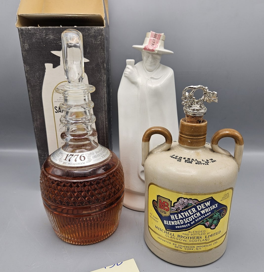 3 bottles, 1776 Whiskey (Opened but full) Crystal Decanter (signed Tiffany), Sandeman (Empty), Heath: 3 bottles, 1776 Whiskey (Opened but full) Crystal Decanter (signed Tiffany), Sandeman (Empty), Heather Dew Whisky partial. --- Buyers are encouraged to pick up their purchases directly from our locati