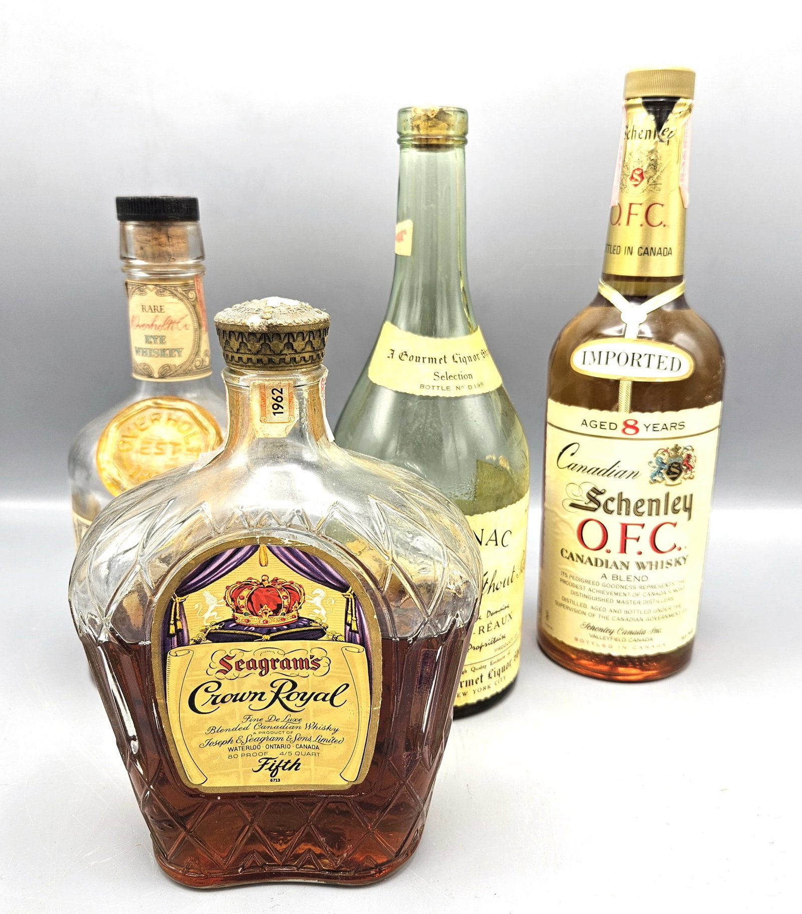 4 bottles Crown Royal, Schenley, Overholt 1810, Cognac Whiskey: 4 bottles Crown Royal, Schenley, Overholt 1810, Cognac Whiskey --- Buyers are encouraged to pick up their purchases directly from our location. Please note: we do not offer shipping for spirits to any
