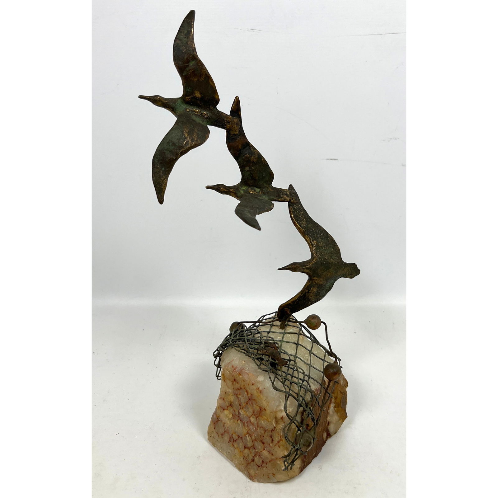 20th C Jere Metal Flying Bird Sculpture. Fishing Net above Natural Rock. Label. (1 of 8)