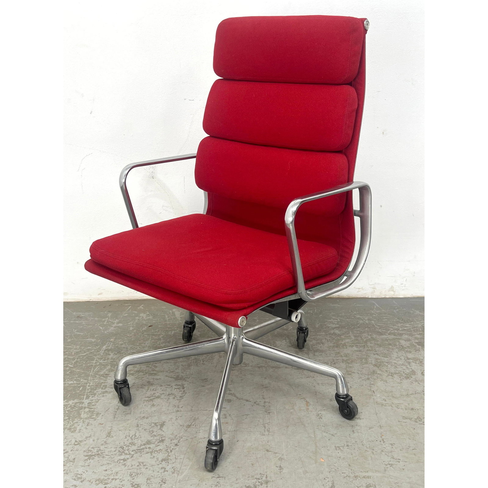 Executive Soft Pad Armchair in red fabric for Herman Miller, designed by Charles and ray Eames (1 of 11)