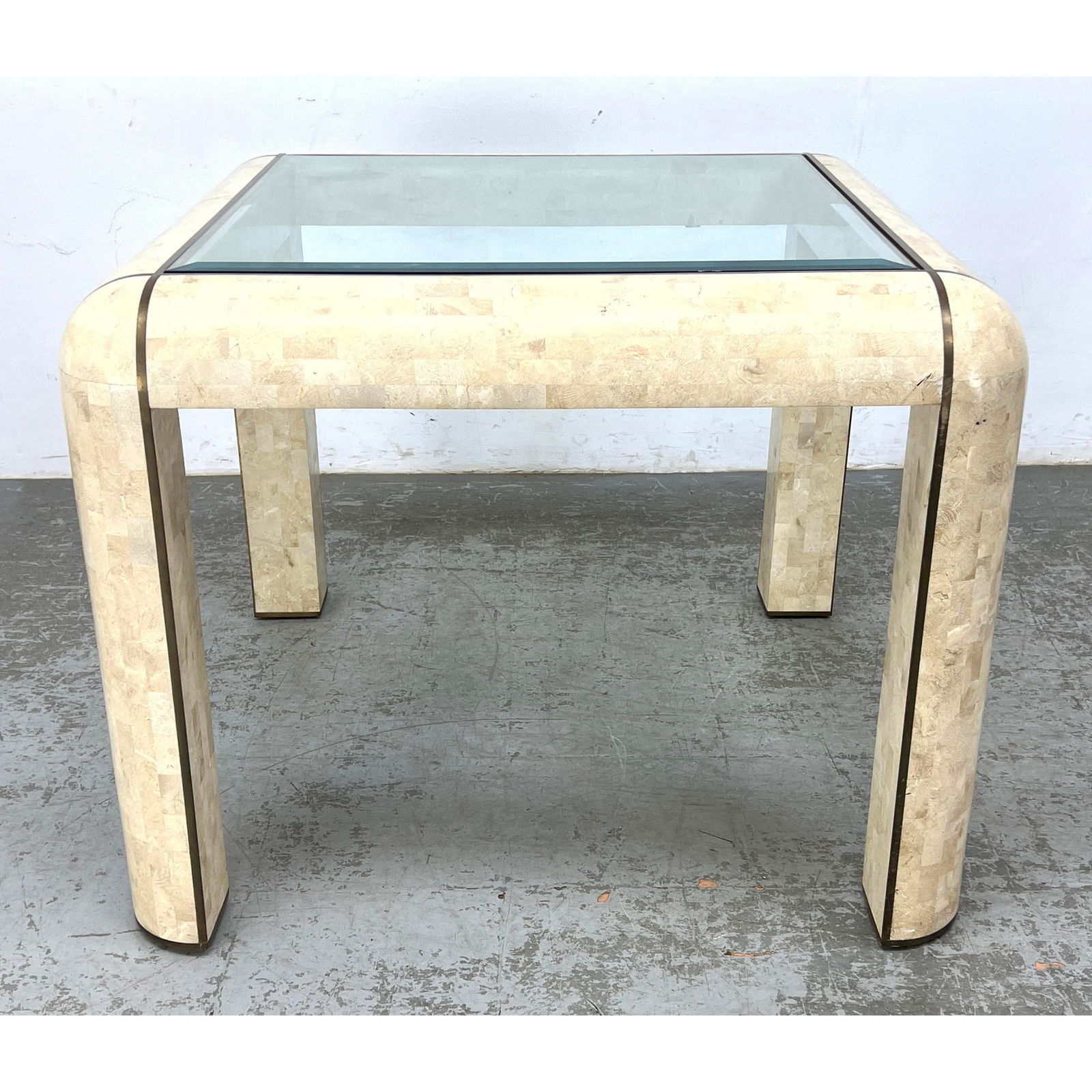 Maitland Smith style Dining Table. Fossilized Stone Tessellated Tile Inlay with Brass Trim Accents. (1 of 11)