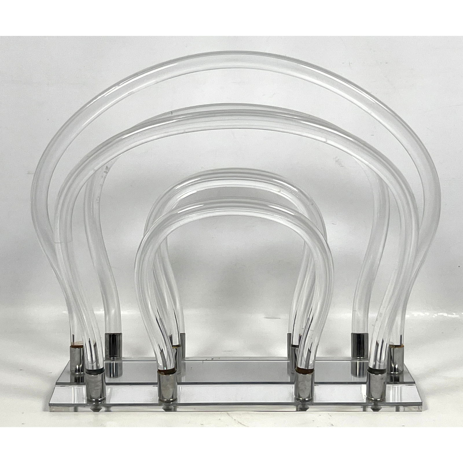 Dorothy Thorpe Style Magazine rack. Lucite and chrome with mirrored glass base.: Dorothy Thorpe Style Magazine rack. Lucite and chrome with mirrored glass base. Dimensions: Height: 12 inches, Width: 15 inches, Depth: 9 inches. --- US Packing and Shipping charge: In house shipping