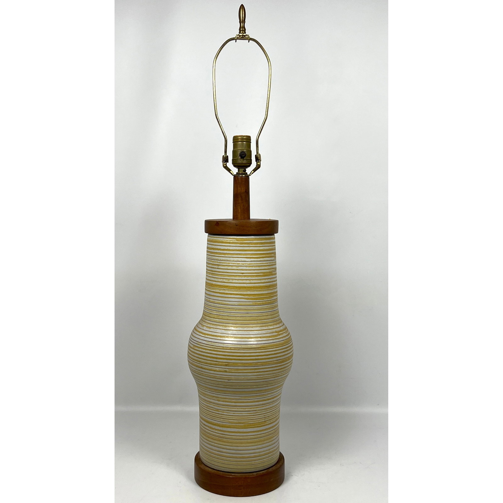 Gordon and Jane Martz large ceramic and walnut table lamp with yellow circular stripe motif. America (1 of 10)