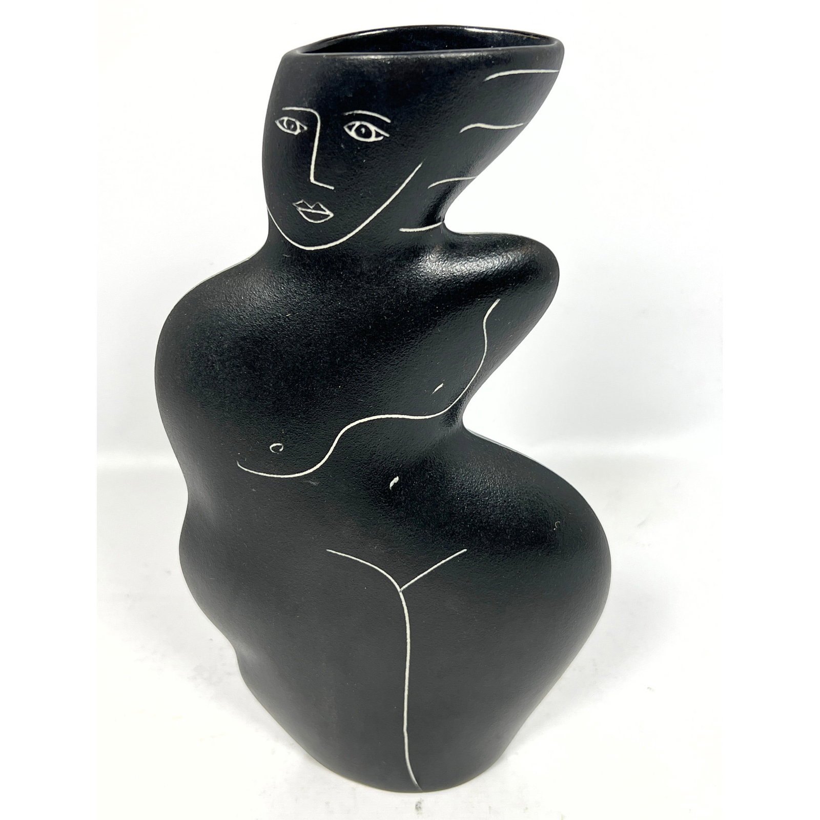 DONNA POLSENO Figural Porcelain Vase. American Studio Artist. Black Glazed Female Nude Form. Contemp: DONNA POLSENO Figural Porcelain Vase. American Studio Artist. Black Glazed Female Nude Form. Contemporary. Artist Signed. Dimensions: Height: 11 inches, Width: 6.25 inches, Depth: 1.75 inches. --- US 