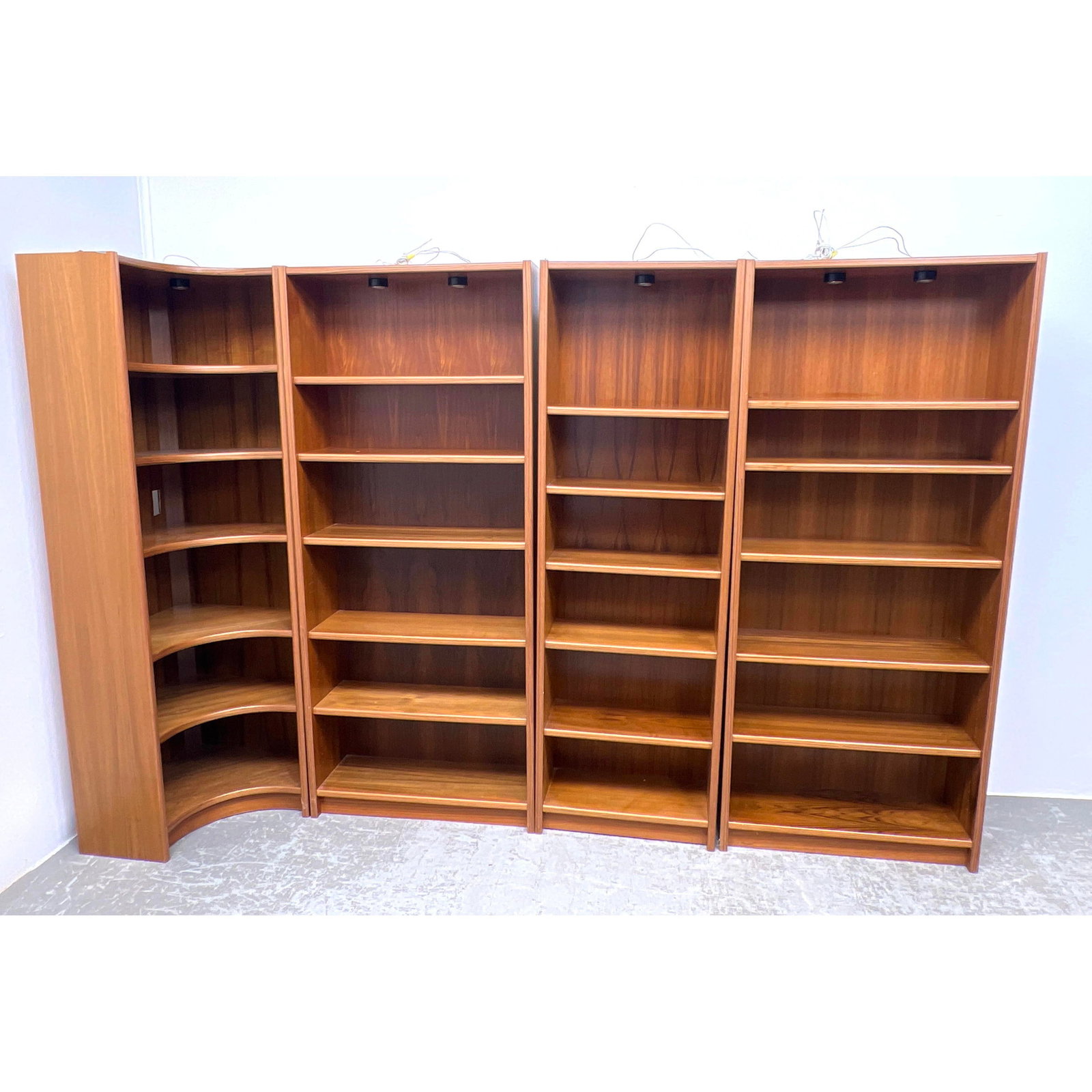 4pc Danish Modern Teak Shelf Units Bookcases. One corner unit; Three upright bookcases with lights. (1 of 18)