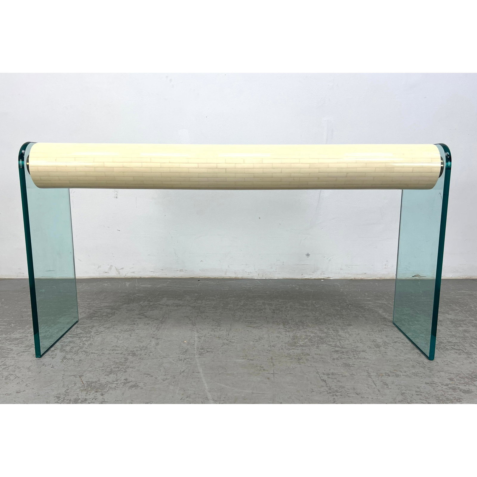 Enrique Garcia Tessellated Bone, Brass and Glass Console. Made in Columbia label. Decorator Springer: Enrique Garcia Tessellated Bone, Brass and Glass Console. Made in Columbia label. Decorator Springer Style Dimensions: Height: 29 inches, Width: 54.5 inches, Depth: 16 inches. --- - We offer curbside 