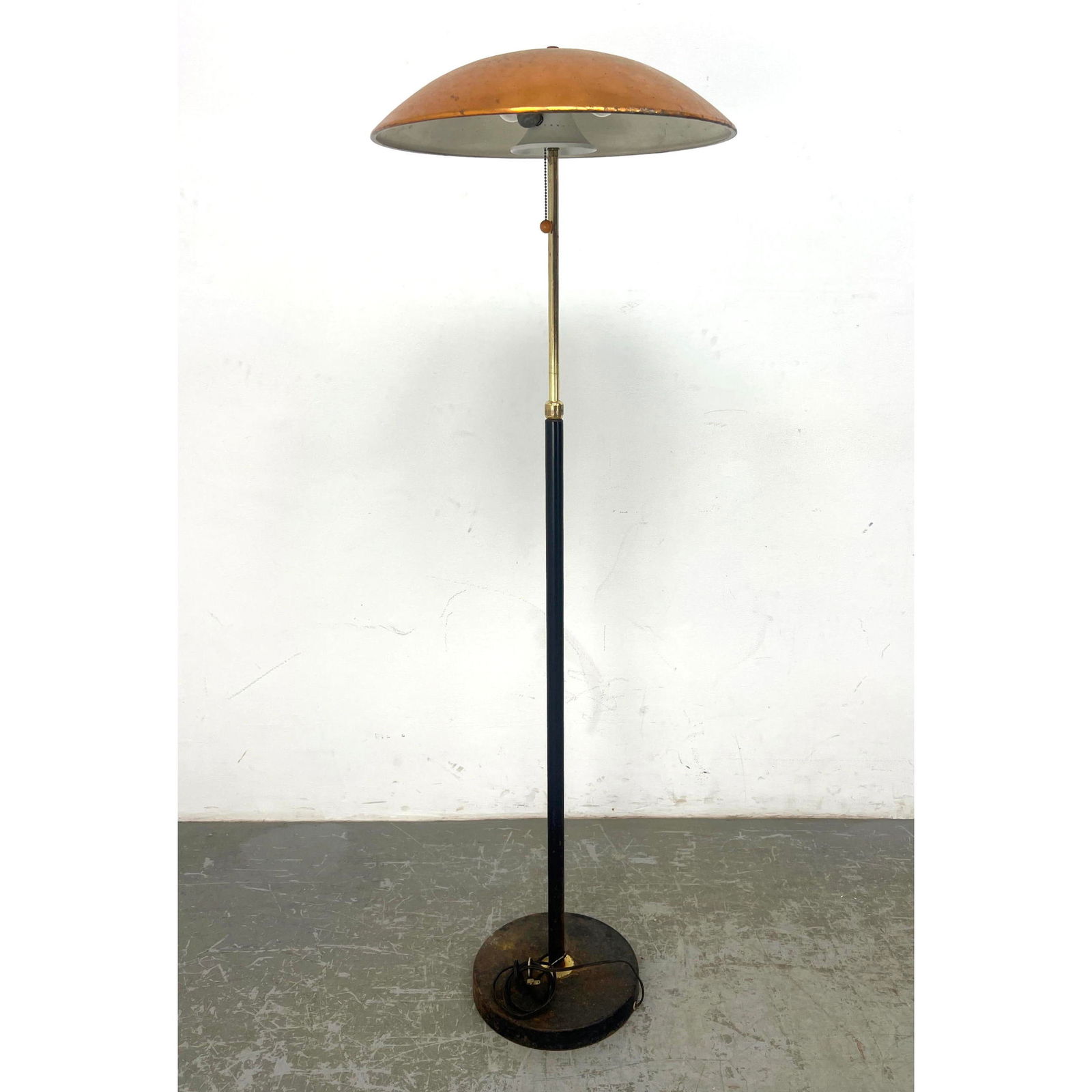 Gerald Thurston Lightolier Swiveling Copper Shade Diffuser Floor Lamp. Multiple settings: Gerald Thurston Lightolier Swiveling Copper Shade Diffuser Floor Lamp. Multiple settings Dimensions: Height: 61 inches, Width: 19.25 inches, Depth: 19.25 inches. --- - We offer curbside delivery for m