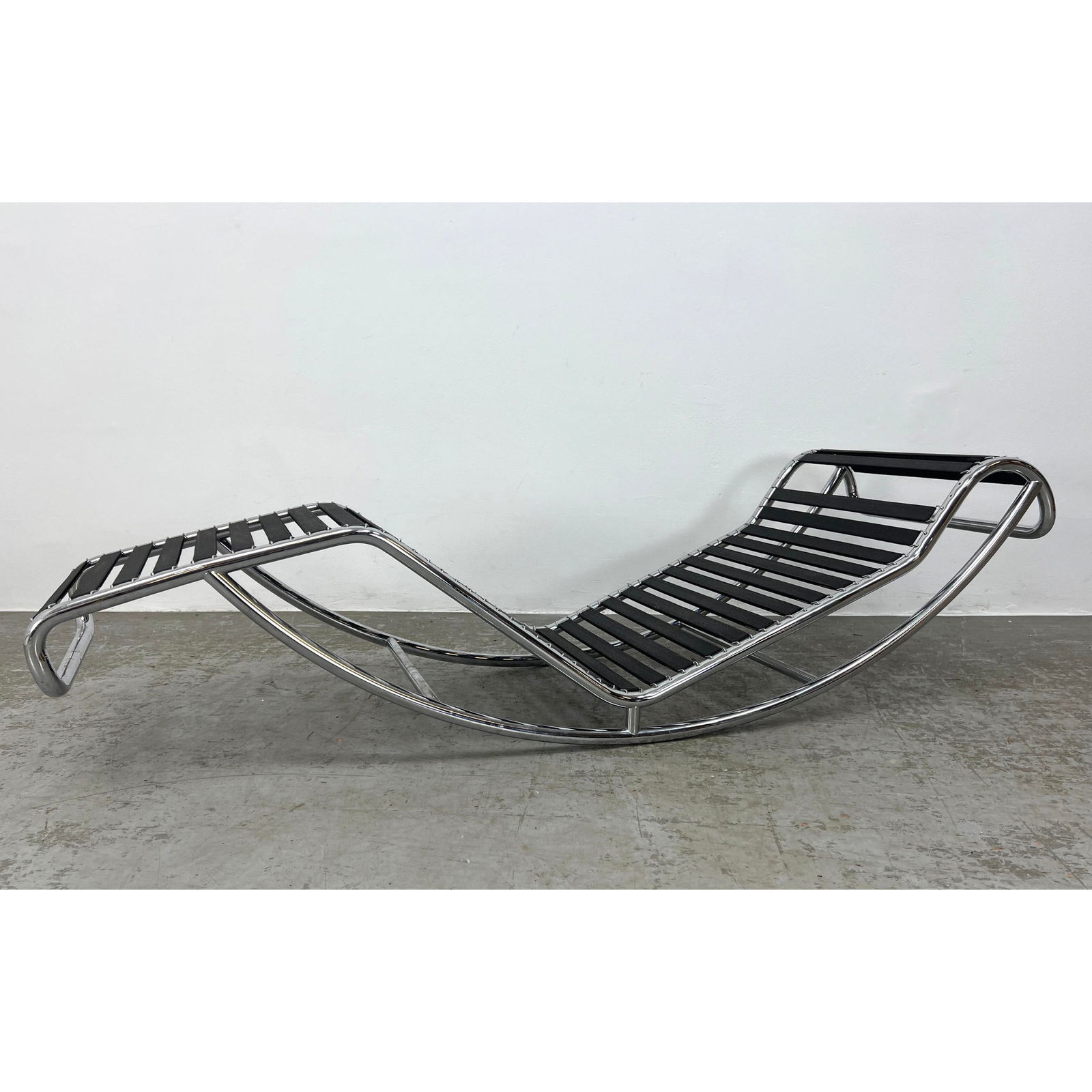 Marked CASSINA Le Corbusier , Charlotte Perriand LC4 Style Chaise Lounge Rocker. Chrome tube frame.: Marked CASSINA Le Corbusier , Charlotte Perriand LC4 Style Chaise Lounge Rocker. Chrome tube frame. Elastic straps. NO CUSHION. Marked CASSINA, Also marked Corbusier. Perriand. Dimensions: Height: 22