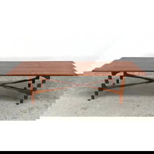 Folke Ohlsson coffee table. Danish Modern Teak Coffee Table has Elegant X Frame Stretchers. Marked:: Folke Ohlsson coffee table. Danish Modern Teak Coffee Table has Elegant X Frame Stretchers. Marked: Denmark, AS RANDERS Dimensions: Height: 16 inches, Width: 62 inches, Depth: 22 inches. --- - We offe