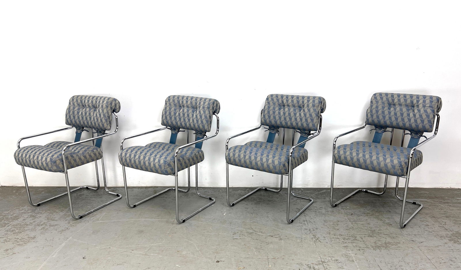 Set 4 Guido Faleschini Mariani Attributed Chrome Frame Dining Arm Chairs. Upholstery with strap acce: Set 4 Guido Faleschini Mariani Attributed Chrome Frame Dining Arm Chairs. Upholstery with strap accent details. Unmarked. Dimensions: Height: 32 inches, Width: 20.5 inches, Depth: 25 inches. - Seat He