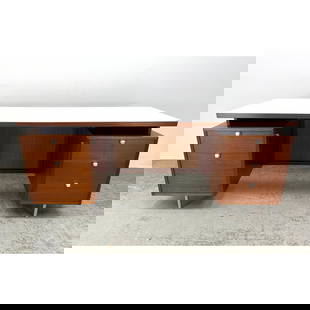 George Nelson Executive desk for Herman Miller. Elegant Walnut Grain Cabinet has signature Nelson Pu: George Nelson Executive desk for Herman Miller. Elegant Walnut Grain Cabinet has signature Nelson Pulls. Floating Top. Woven Rattan Detail. Labeled. Dimensions: Height: 29 inches, Width: 72.5 inches,
