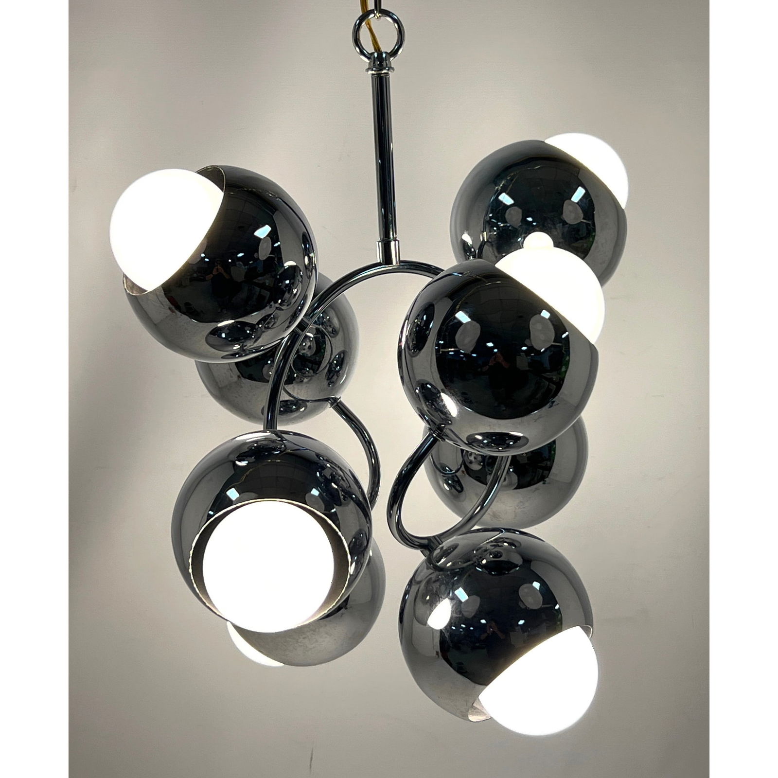 Robert Sonneman Molecule Chandelier. Eight Chrome Ball Shade Lights. Spiral arms.: Robert Sonneman Molecule Chandelier. Eight Chrome Ball Shade Lights. Spiral arms. Dimensions: Height: 19 inches, Width: 16 inches, Depth: 16 inches. --- US Packing and Shipping charge: In house shippi