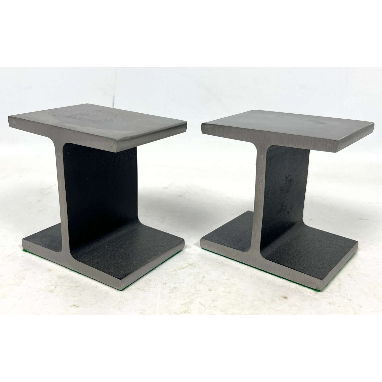 Pr Industrial Steel I Beam Bookends.: Pr Industrial Steel I Beam Bookends. Dimensions: Height: 4 inches, Width: 3 inches, Depth: 4 inches. --- US Packing and Shipping charge: $35 Plus required insurance at a rate of $2 per hundred. - We o
