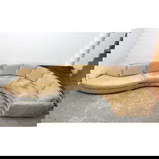 Modernist Serpentine  Sectional Sofa and Tables. Consists of 3 curved section sofa and 2 Fabric Cov: Modernist Serpentine Sectional Sofa and Tables. Consists of 3 curved section sofa and 2 Fabric Covered Sofa Tables that nest along back of Couch. One table is attached to sofa back. Dimensions: Height