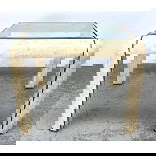 Maitland Smith style Dining Table. Fossilized Stone Tessellated Tile Inlay with Brass Trim Accents.: Maitland Smith style Dining Table. Fossilized Stone Tessellated Tile Inlay with Brass Trim Accents. Inset Glass Top. Dimensions: Height: 30 inches, Width: 38 inches, Depth: 38 inches. --- - We offer c