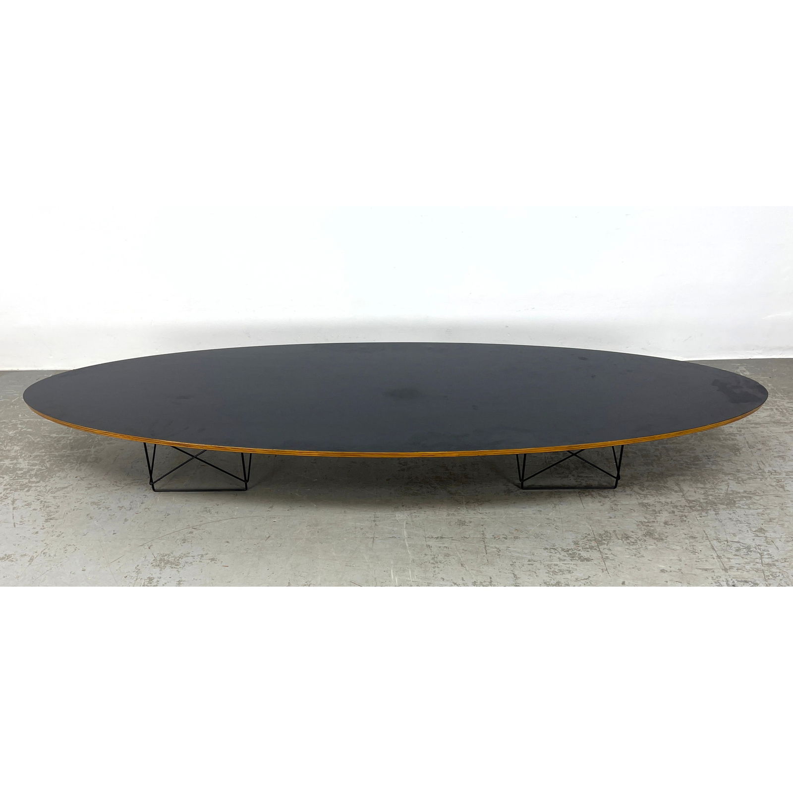 Elliptical Coffee Table. CHARLES and RAY EAMES. Black Laminate Top Surfboard Cocktail Table. Not Mar (1 of 9)
