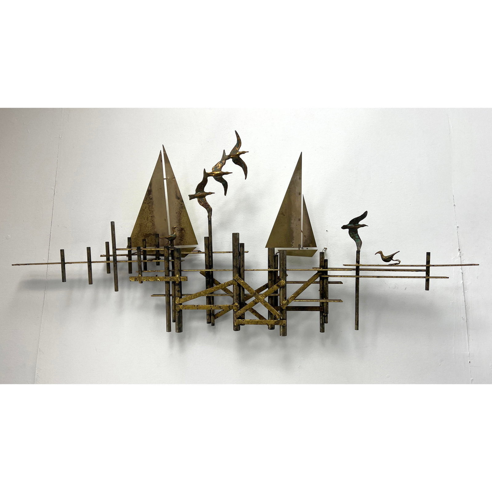 C. Jere Sailboats and Seagulls Brass Wall Sculpture: C. Jere Sailboats and Seagulls Brass Wall Sculpture Dimensions: Height: 20 inches, Width: 49 inches, Depth: 4.5 inches. --- - We offer curbside delivery for most items to NYC, Manhattan, Close Brookly