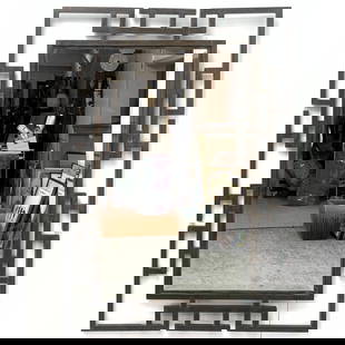 Bronze Decorator Wall Mirror in the Manner of Phillip and Kelvin Laverne.: Bronze Decorator Wall Mirror in the Manner of Phillip and Kelvin Laverne. Dimensions: Height: 46.25 inches, Width: 32 inches, Depth: 1 inches. --- - We offer curbside delivery for most items to NYC, M