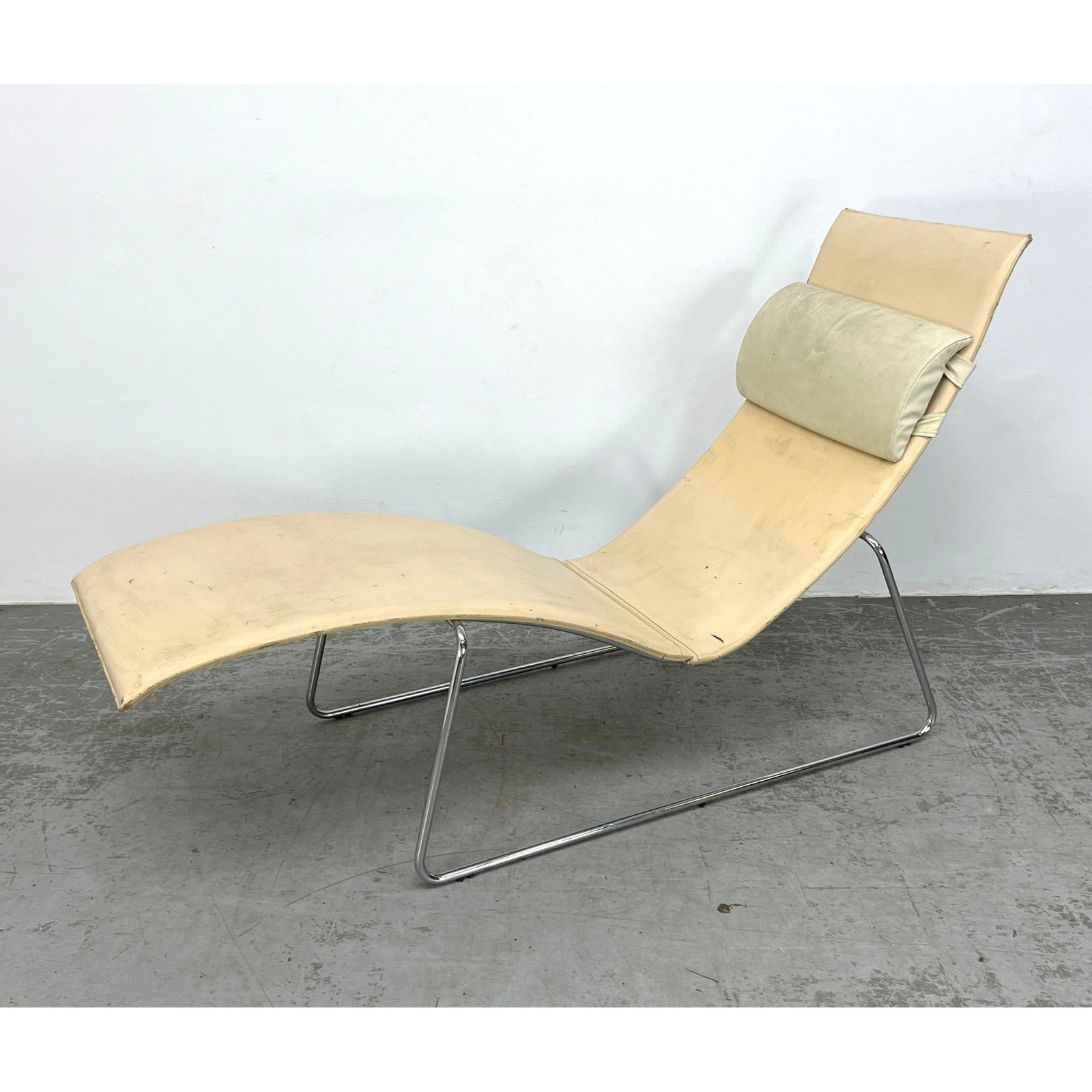 Modernist Leather and Chrome Frame Chaise Lounge. Cream: Modernist Leather and Chrome Frame Chaise Lounge. Cream Dimensions: Height: 36.5 inches, Width: 24 inches, Depth: 62 inches. - Seat Height: 10 inches --- - We offer curbside delivery for most items to