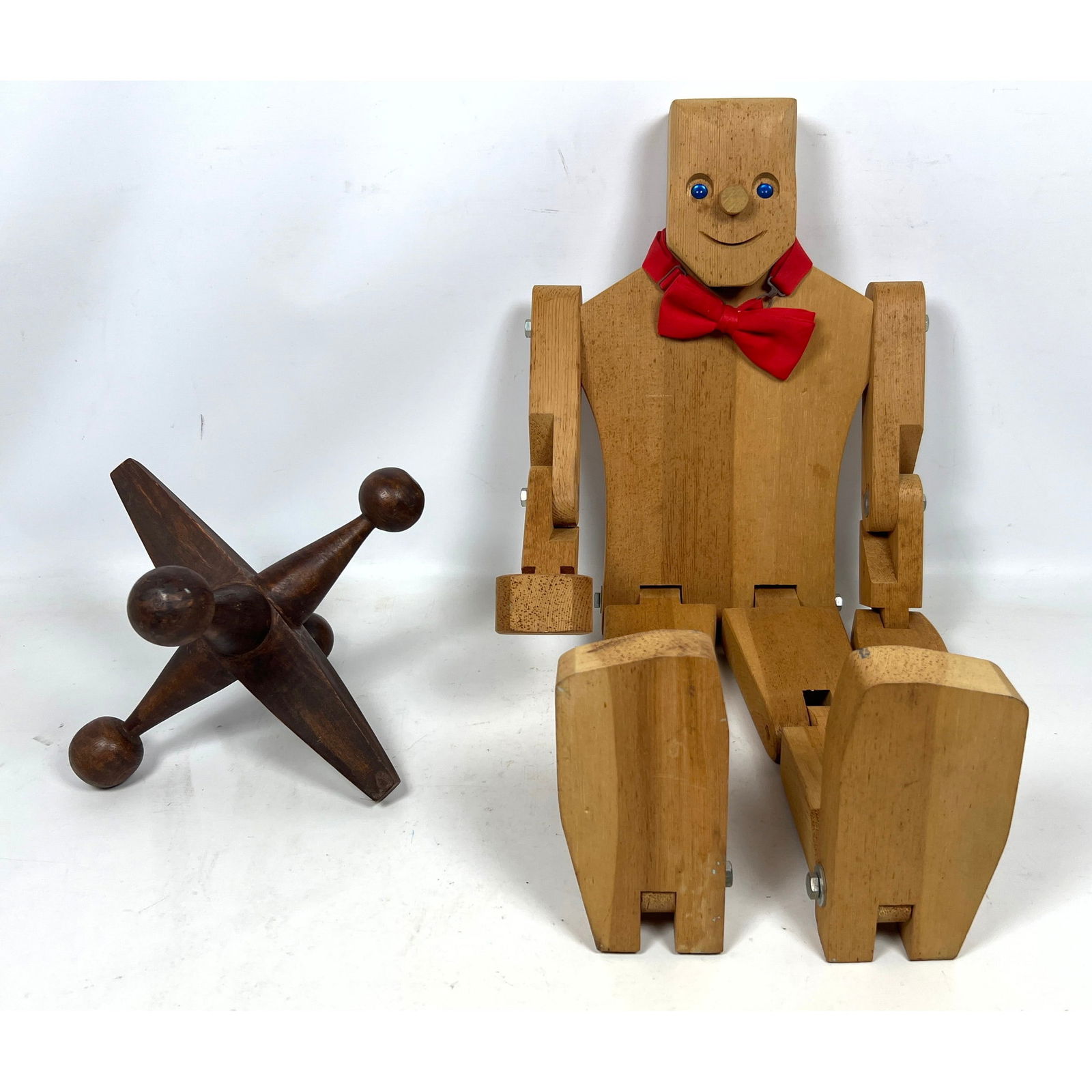 2pcs Wood Decorative Objects. Jack Jax, Don Ellefson Articulated Wood Man Sculpture: 2pcs Wood Decorative Objects. Jack Jax, Don Ellefson Articulated Wood Man Sculpture Dimensions: Height: 30 inches, Width: 12 inches, Depth: 4 inches. - Additional Dimensions: Jack H: 11 inches, W: 11