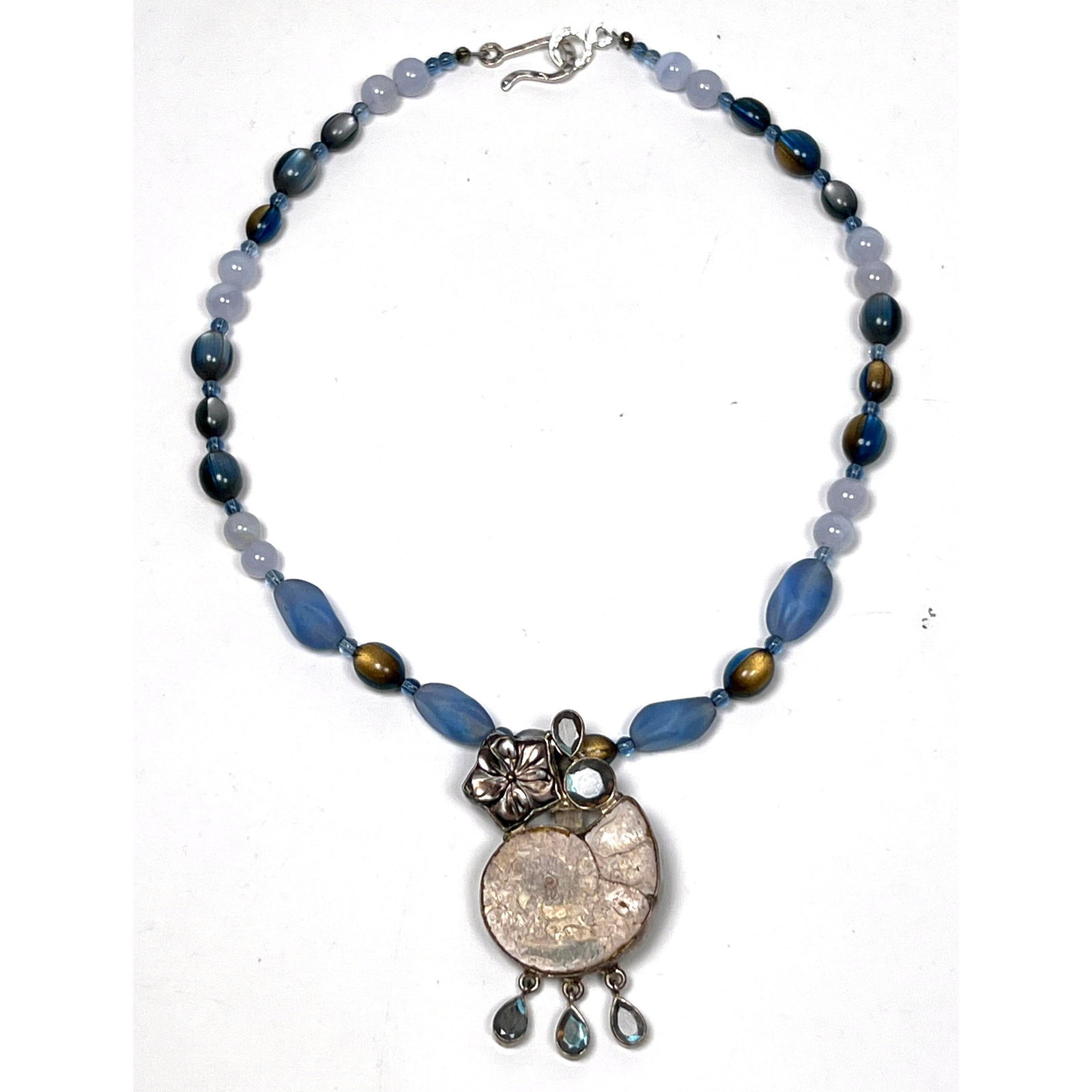 Ammonite Pendant on Stone and Glass bead Necklace. Studio Hand Made.: Ammonite Pendant on Stone and Glass bead Necklace. Studio Hand Made. Dimensions: Height: 20 inches, Width: .5 inches. --- US Packing and Shipping charge: Jewelry: $20 first item. $3 each additional. P