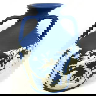 10 inch WEDGWOOD Portland Jasper Ware Vase. Dark Blue Porcelain Handle Vase. Signed.: 10 inch WEDGWOOD Portland Jasper Ware Vase. Impressed WEDGWOOD T L on the bottom rim. Dark Blue Porcelain Handle Vase. Historic Representation of Ancient Greek Vessel. Applied white classical figures