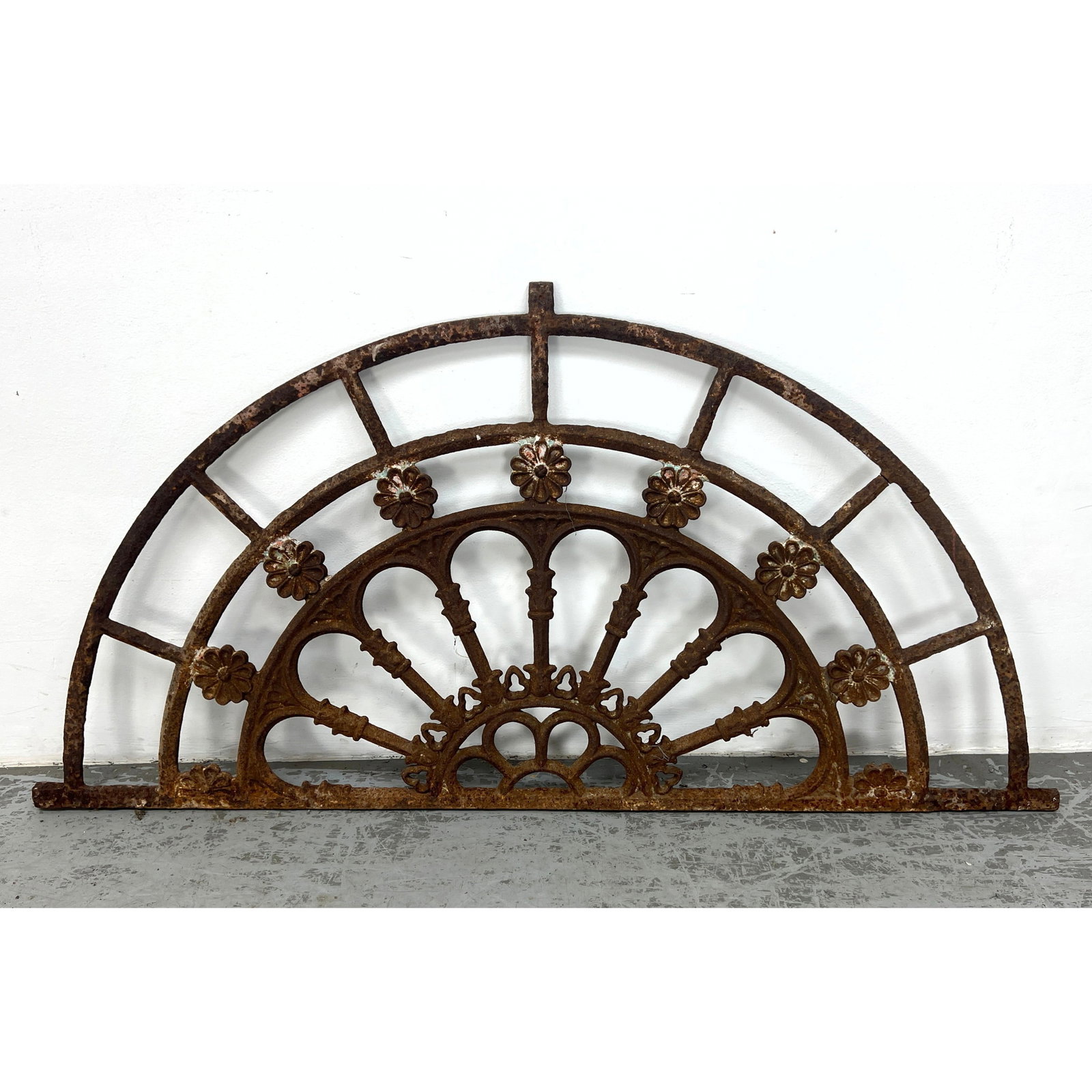 Rusted Antique Iron Arched Grate. Decorative semi circular grate. Garden. Outdoor. Patio.: Rusted Antique Iron Arched Grate. Decorative semi circular grate. Garden. Outdoor. Patio. Dimensions: Height: 32 inches, Width: 64 inches, Depth: 1 inches. --- - We offer curbside delivery for most it